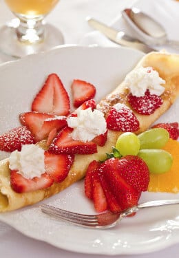 Sweidh Pancakes with strawberries and cream. 