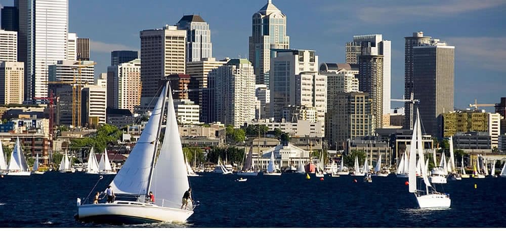 Sailboat in foreground with the Seattle skyline in the background..